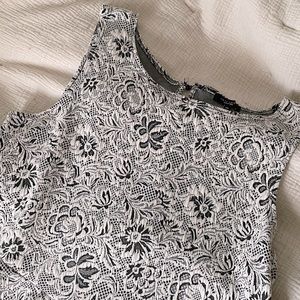 Black and white jacquard print sleeveless peplum top